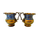 Pair of lustrous Staffordshire earthenware pitchers called "Jersey" earthenware