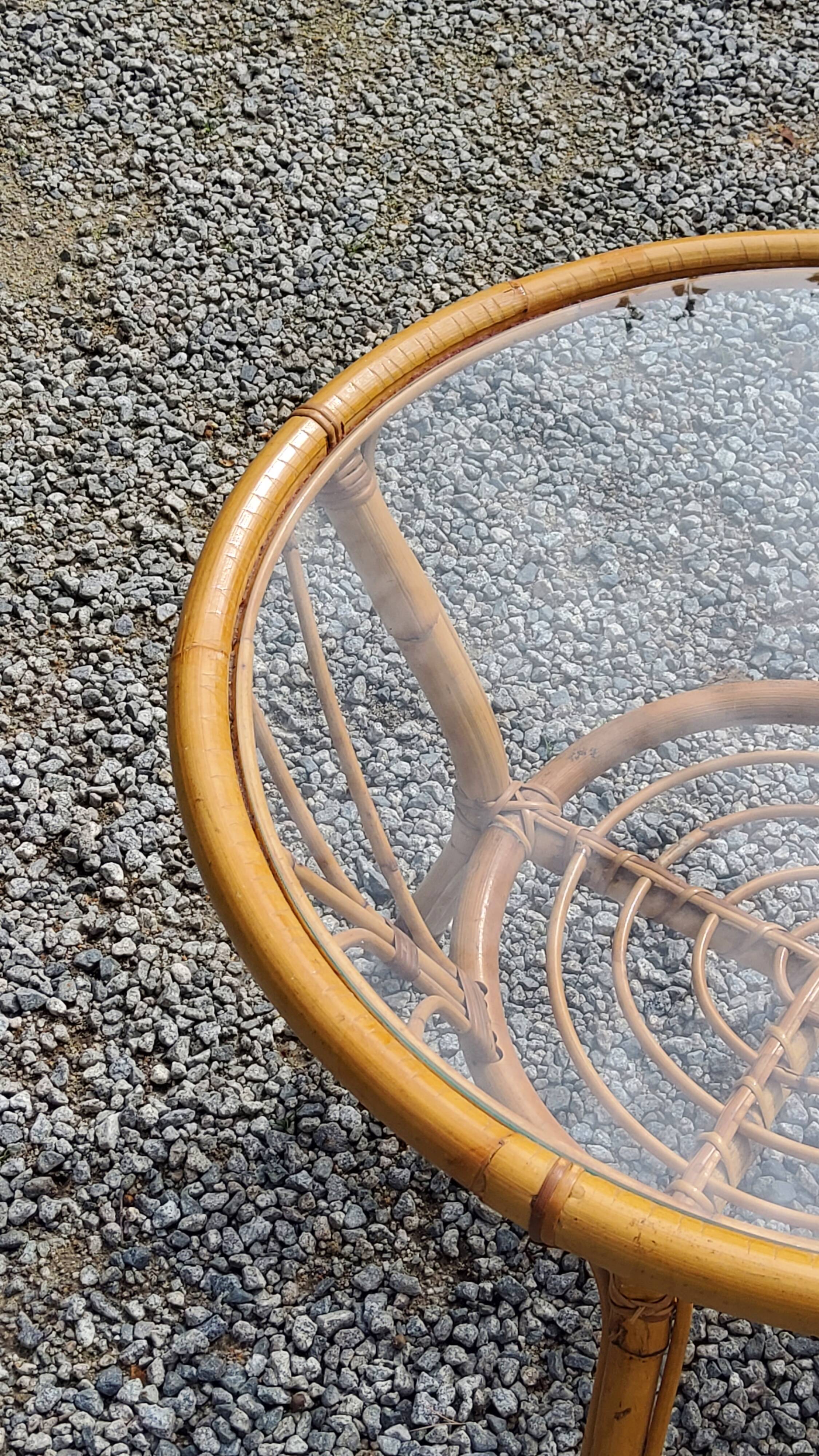 Round rattan coffee table with glass top from the 70s