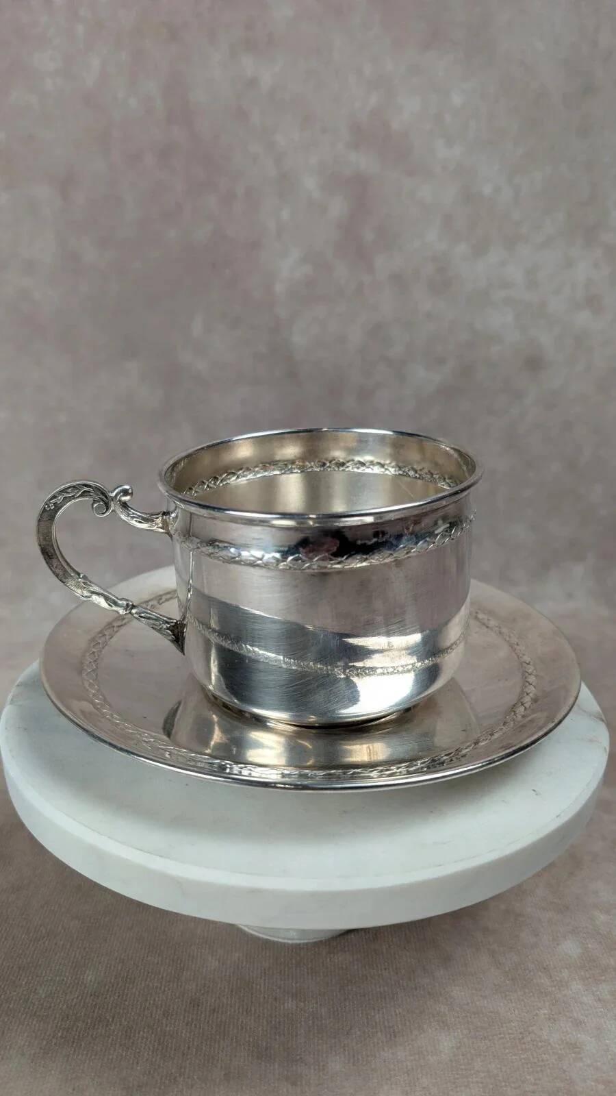 Vintage silver-plated cup and saucer