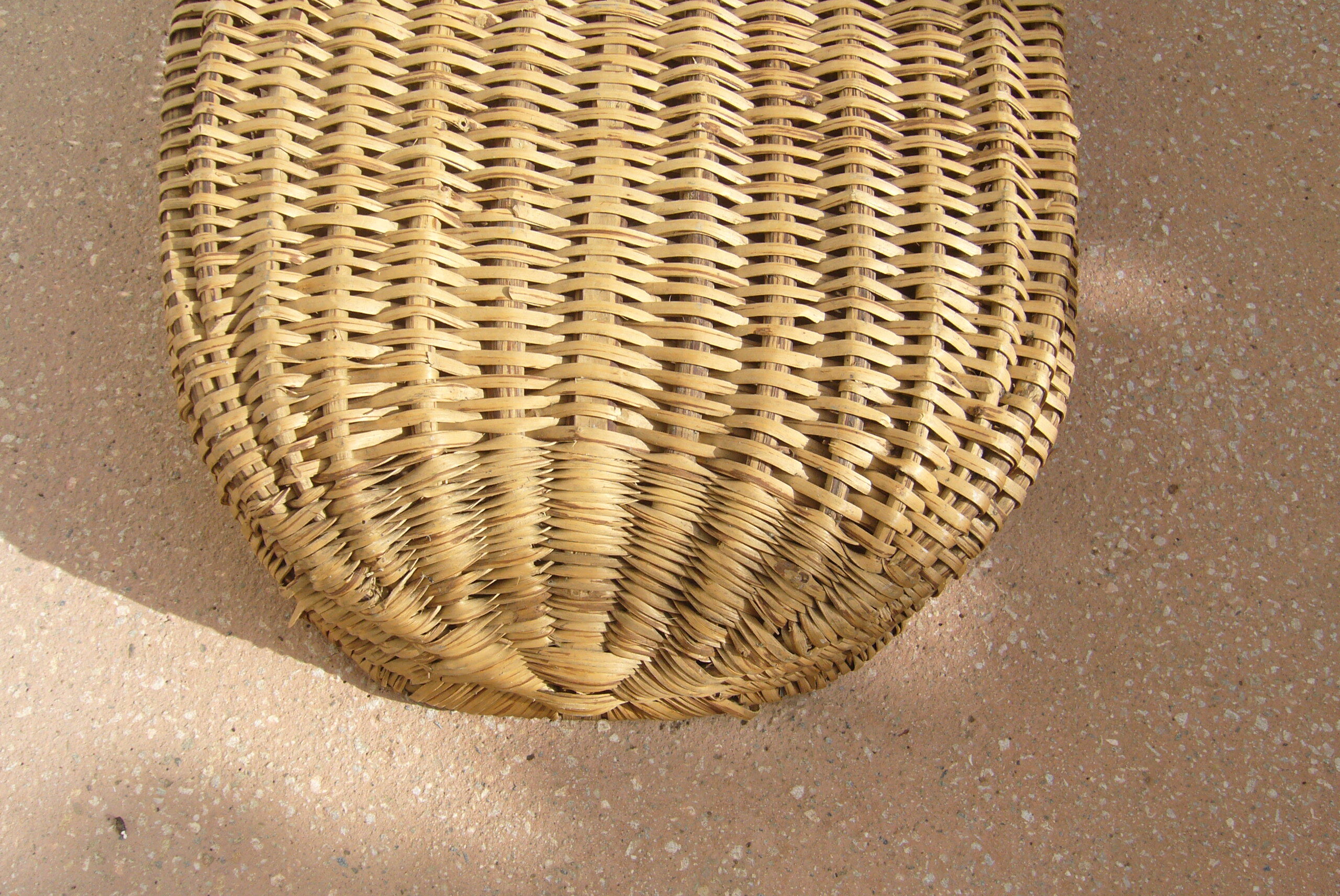 Old wicker laundry basket