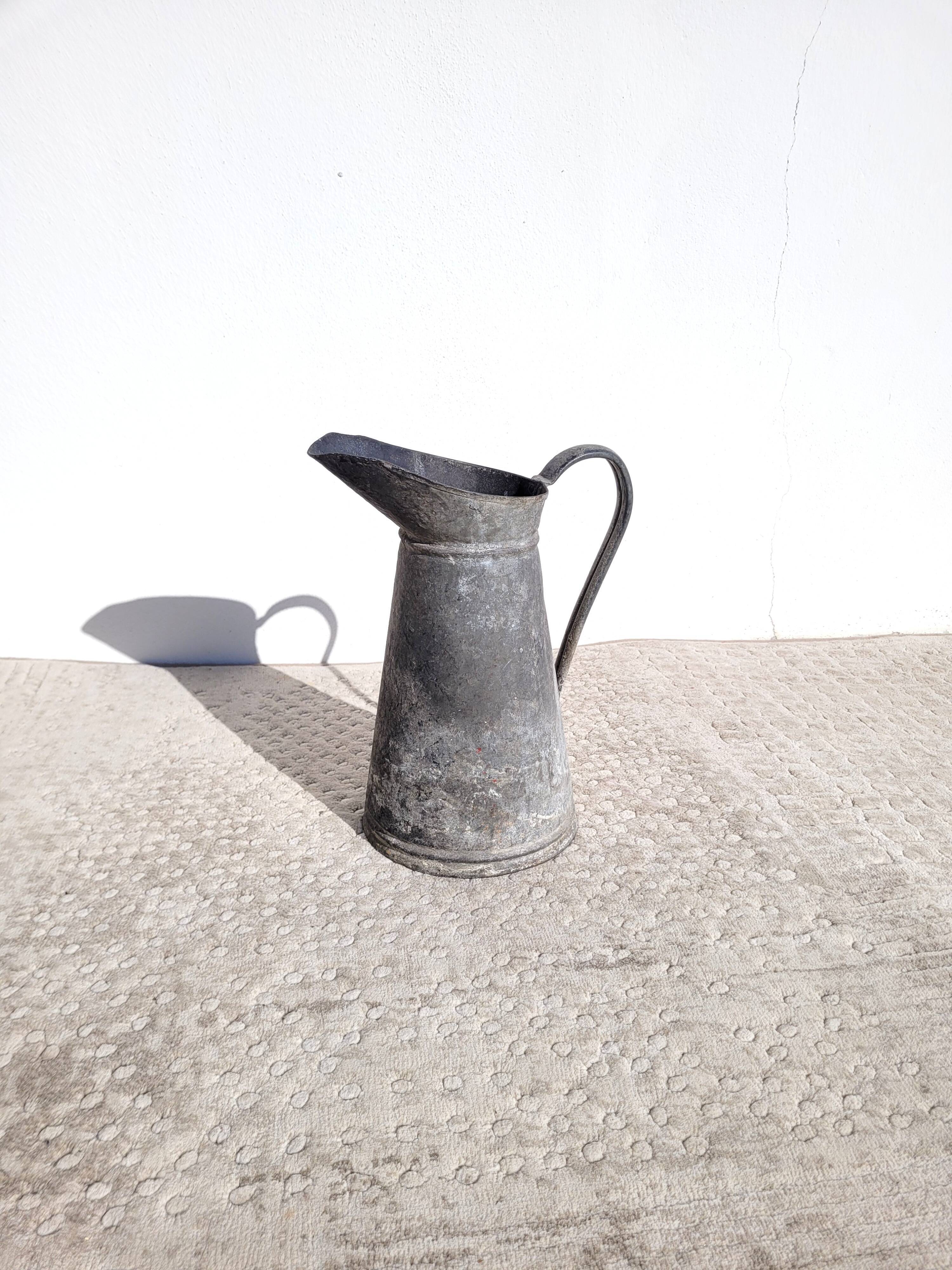 Old vintage zinc pitcher