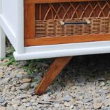 Scandinavian chest of drawers made of wood and rattan