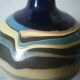 Vase boule en terre mêlée