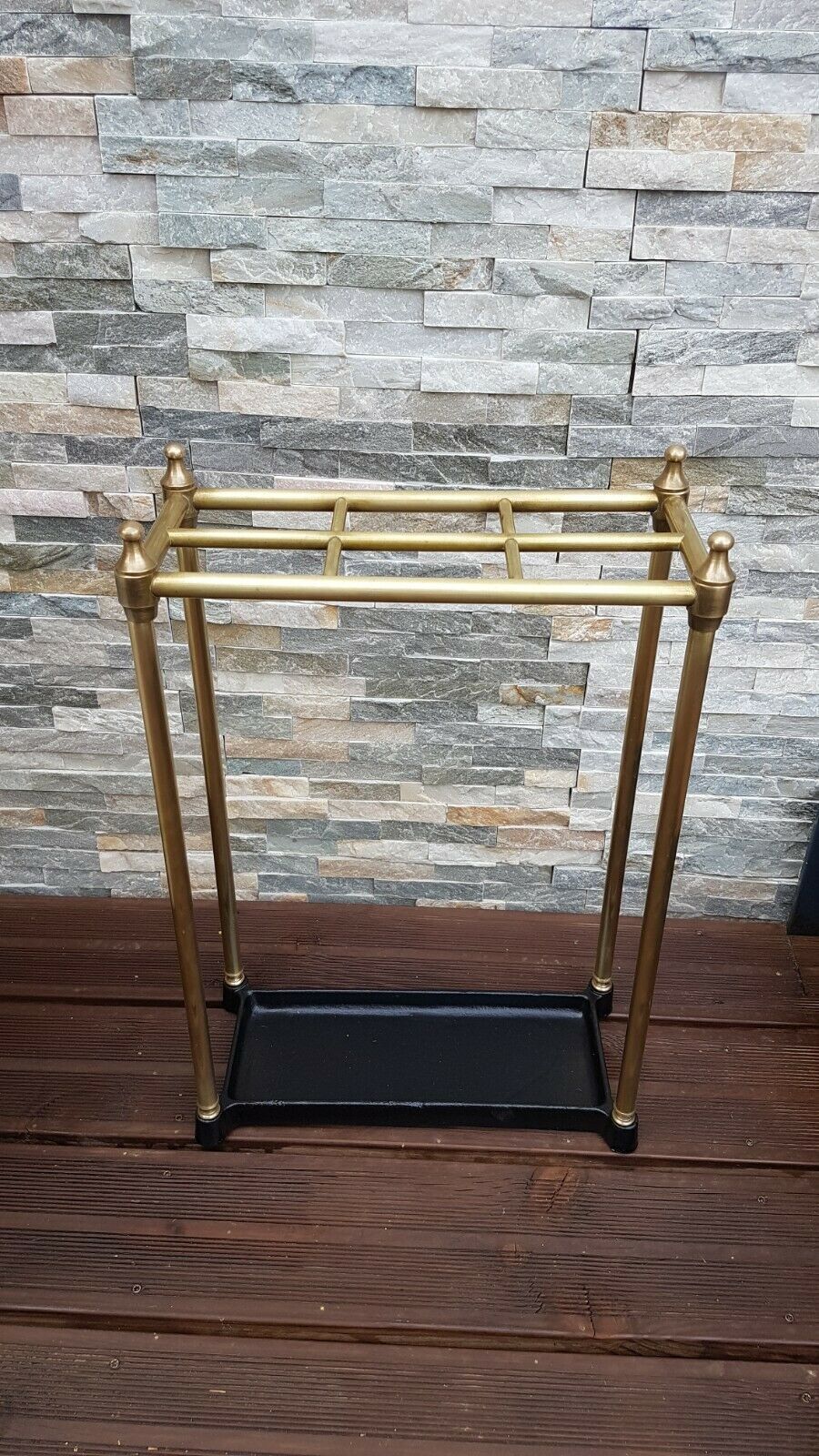 Umbrella door and nineteenth century canes in brass and cast iron