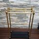 Umbrella door and nineteenth century canes in brass and cast iron