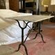 Table de bistrot provencal base cast iron marble top early twentieth century