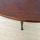Half-moon console grange in solid cherry wood and wrought iron with a glass top.