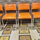 Set de 4 chaises chromées skaï orange 1970 vintage