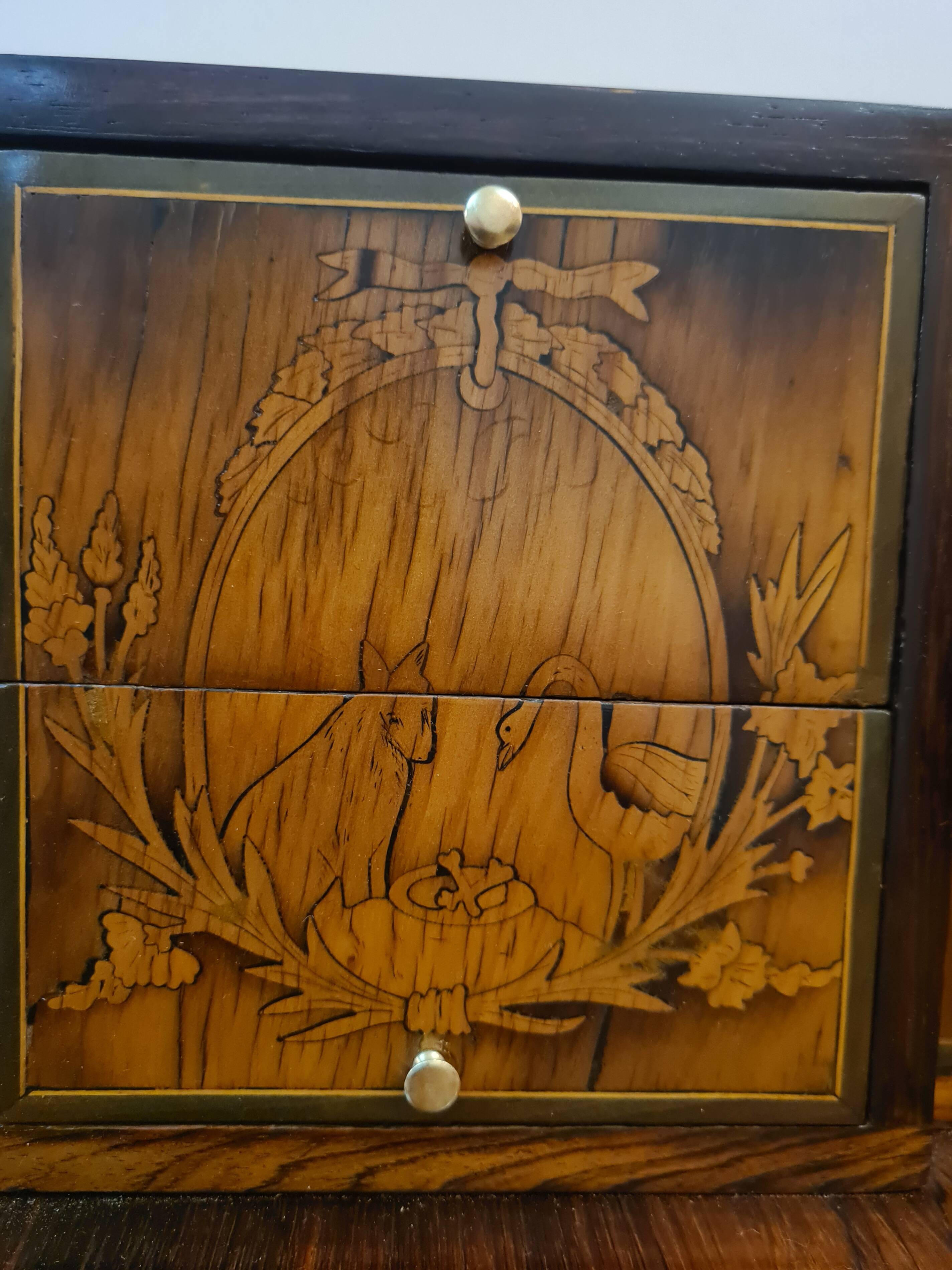 Marquetry stepped desk with La Fontaine's fables, 19th century.