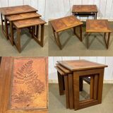 Set of 3 nesting tables in teak with tiled tops.
