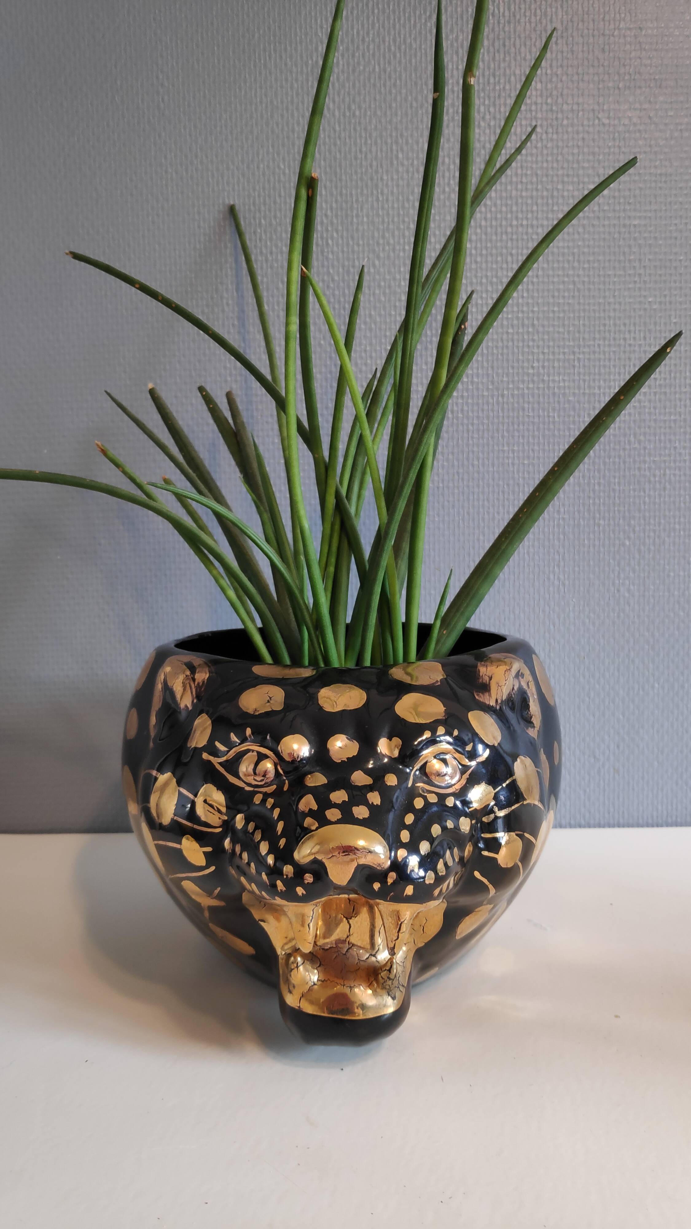 black and gold ceramic panther pot cache