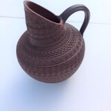 Pitcher in structured brown ceramic