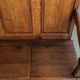 Antique English oak hall bench from the early 19th century with storage space