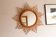 Vintage sun mirror in woven rattan