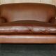 Two-seater leather armchair in Howard style by George Smith.