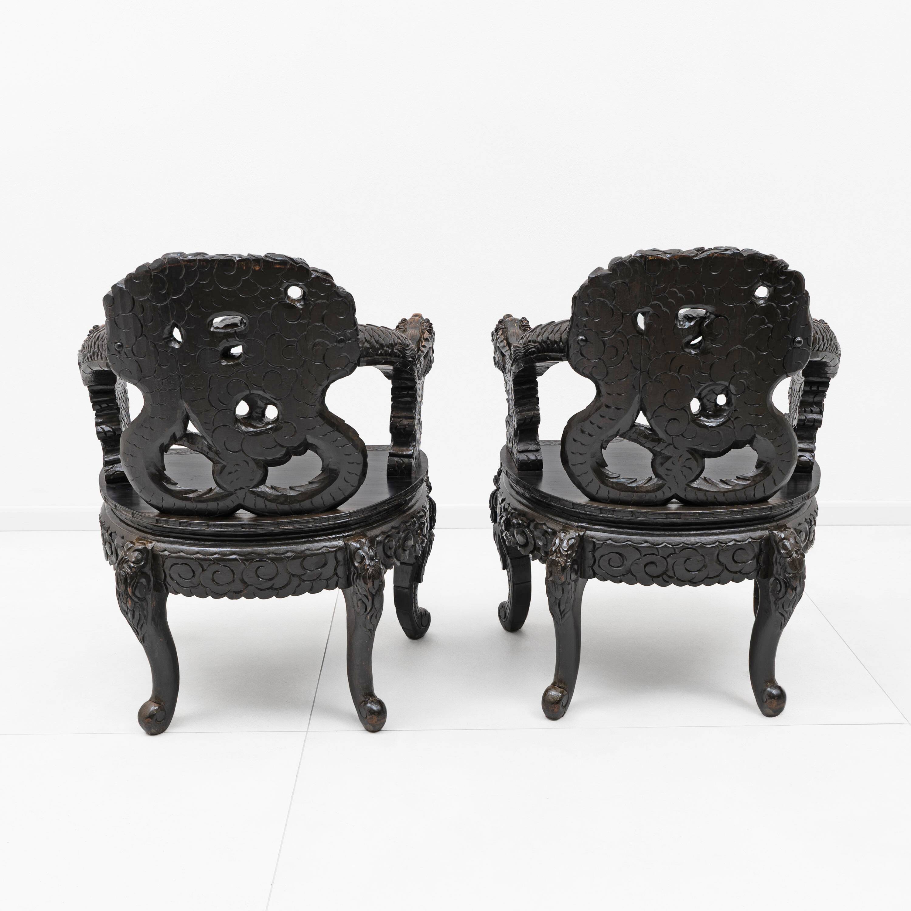 Pair of Chinese Qing Dynasty Carved Dragon Armchairs,Ebonized Hardwood,19th