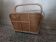 Caned magazine rack