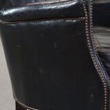 Subtle black armchair with reversible Kelim seat cushion