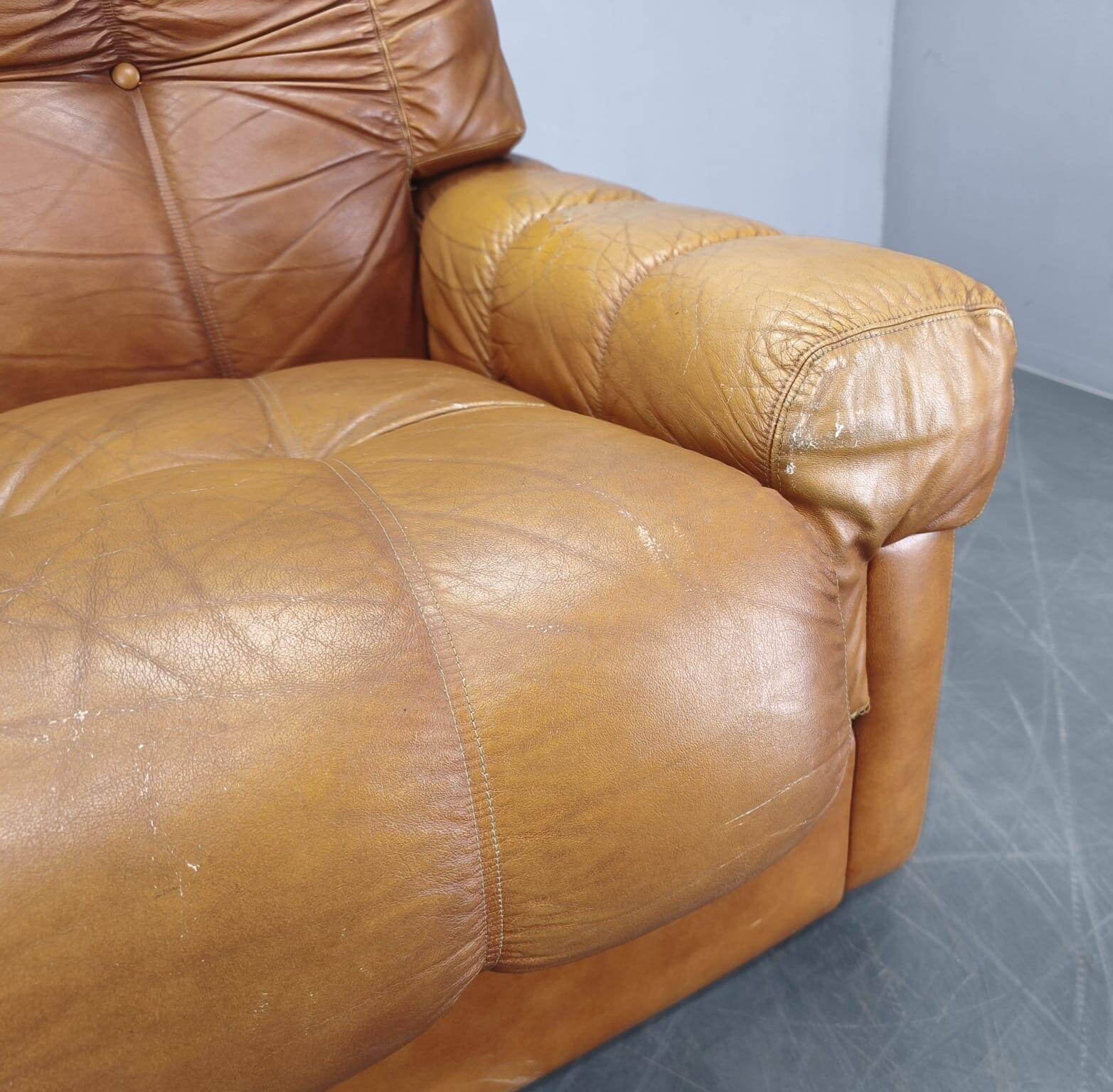 Three-seater sofa from the mid-century produced in Italy in the 1970s.