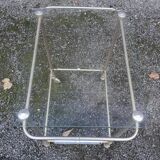 Small rolling table in glass and gold metal