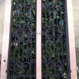 Porte d’entrée ancienne en chêne vitrée grilles en fonte 1925