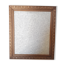 Magnetic frame in carved wood and Nepalese paper rice grain natural background
