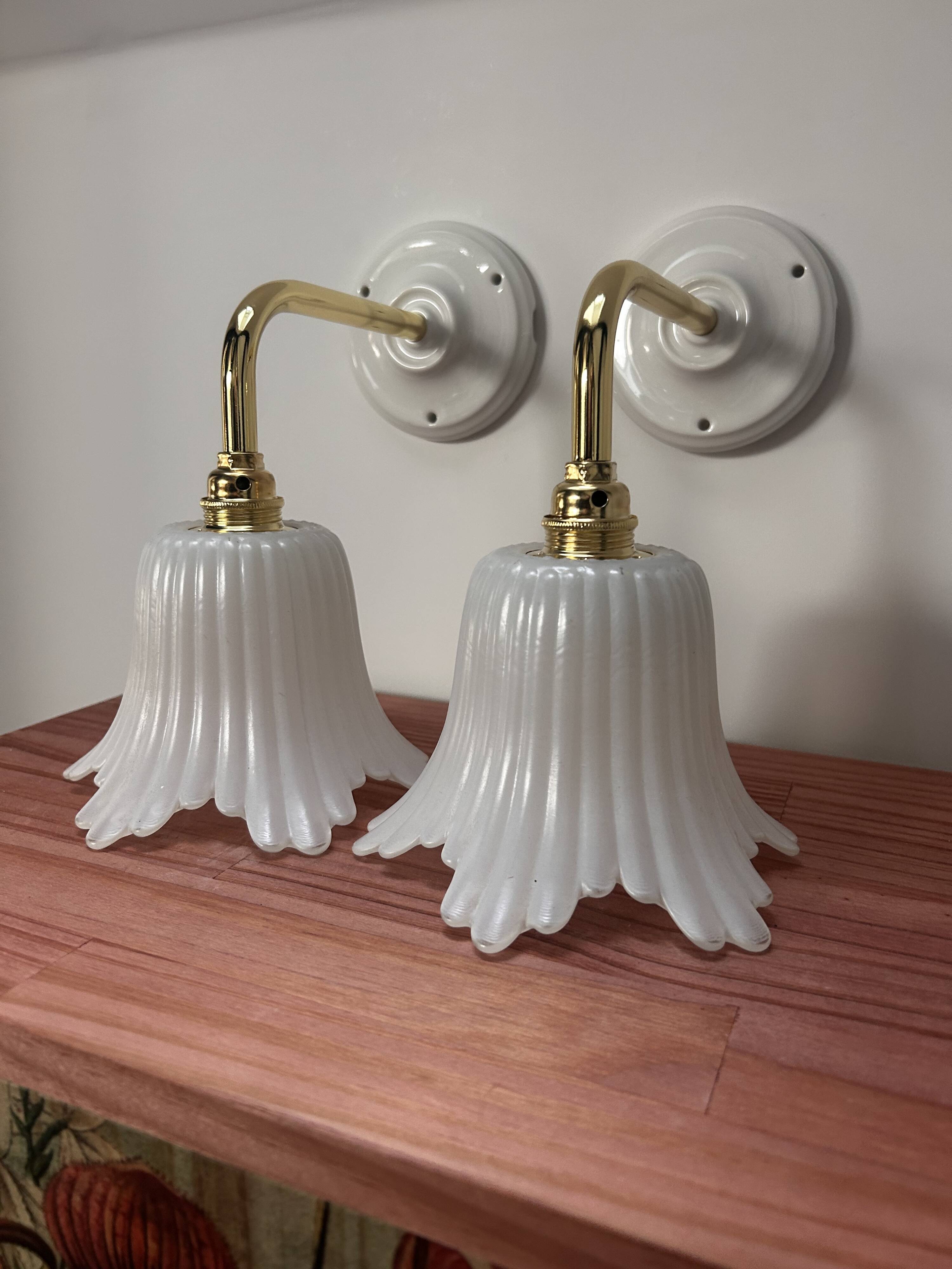 Pair of white tulip wall sconces