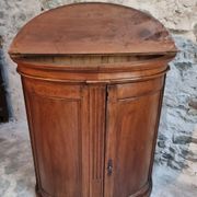 Antique demi-lune cabinet in walnut, late 18th century, French château.