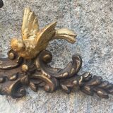 Pediment cherub musician