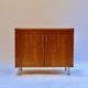 Two-door buffet in manufactured teak, two interior drawers (pastoe).
