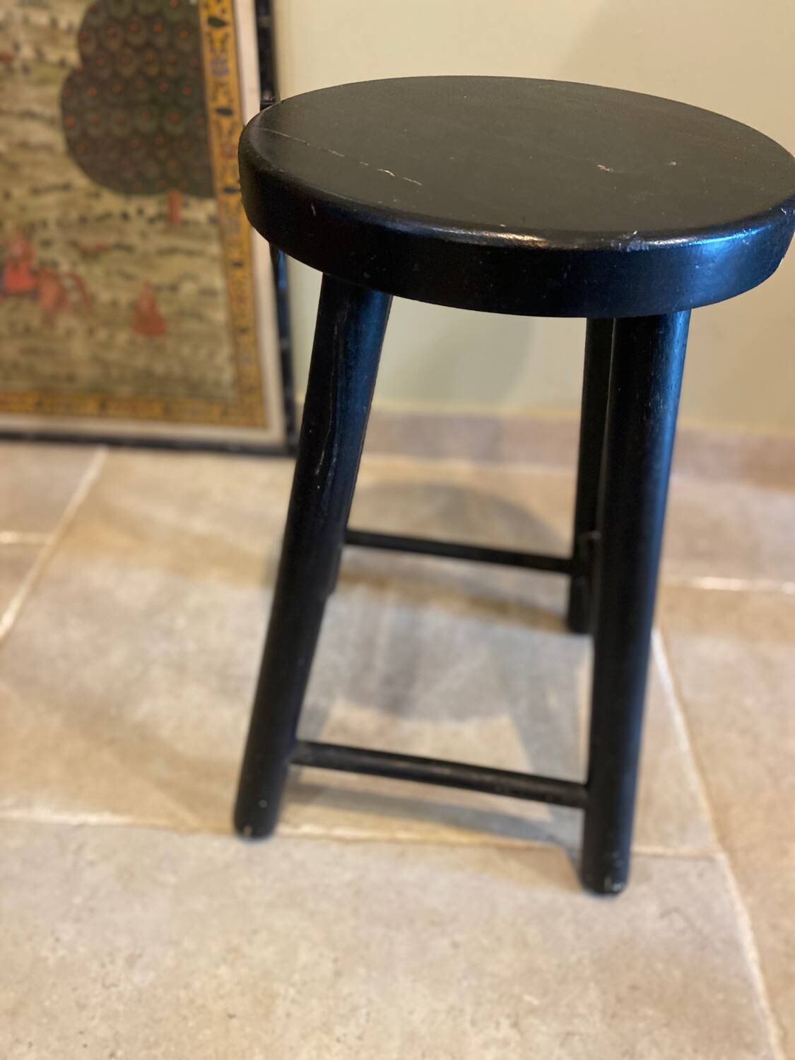 Black wooden stool