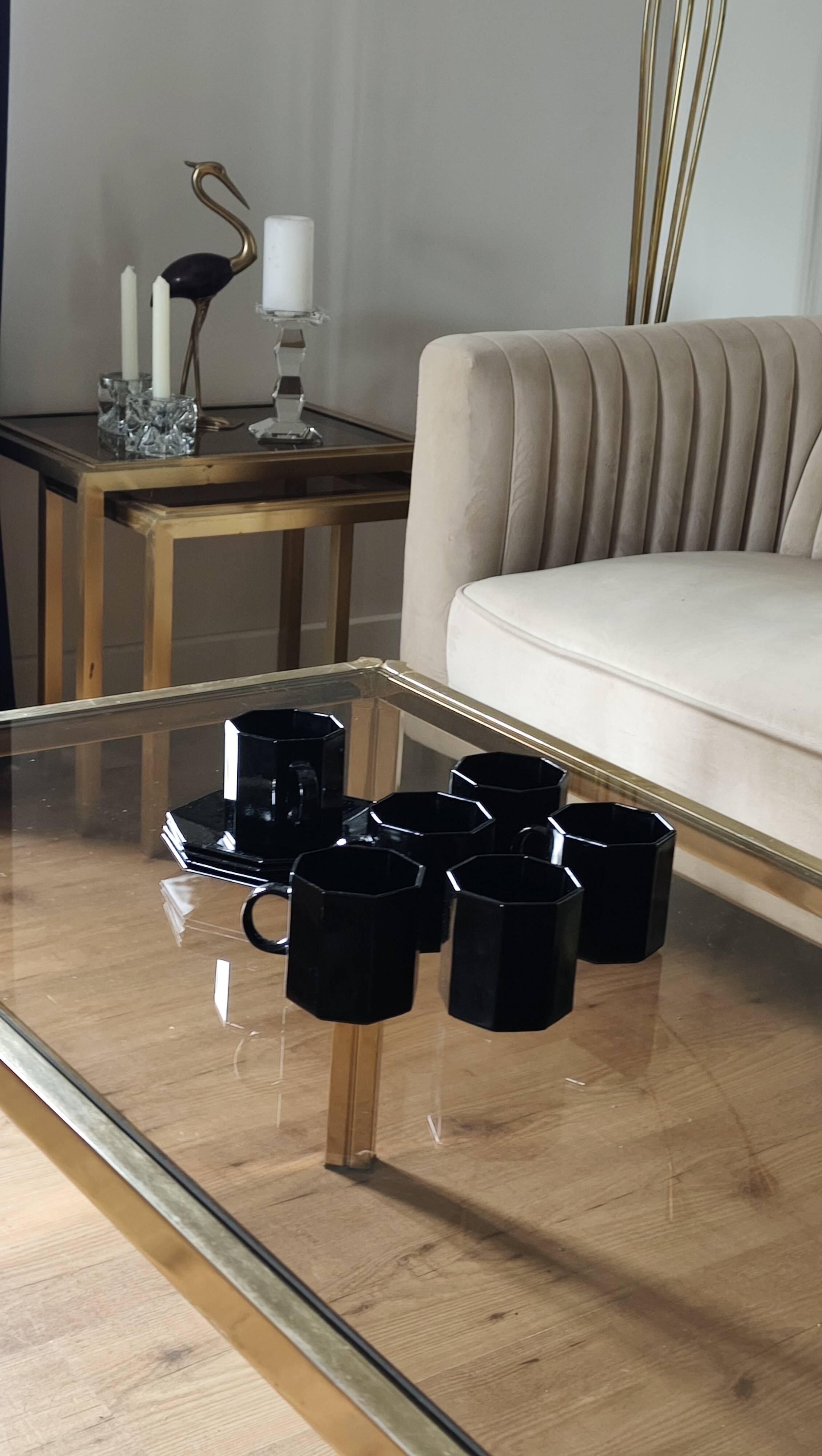 Brass coffee table with smoked glass top