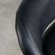 Chaise pivotante vintage en simili cuir noir et chrome, années 70