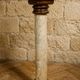 Wood and lacquer pedestal column table mimicking marble, 19th century.