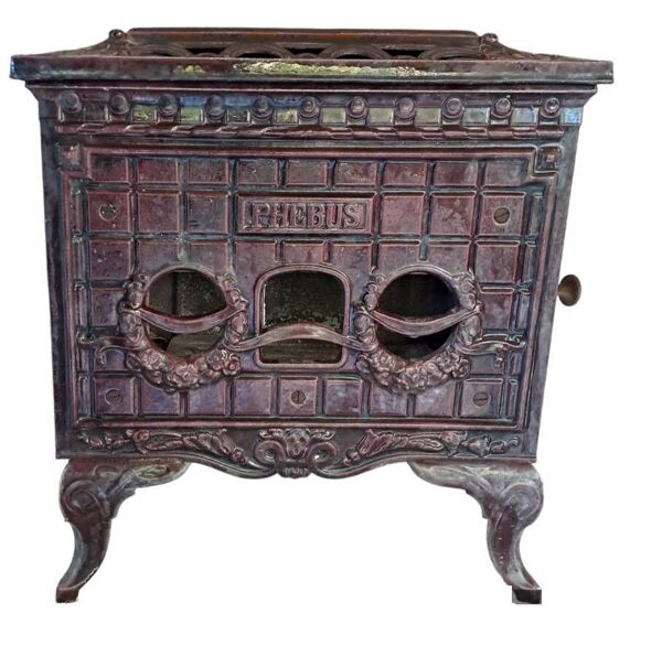 Poêle à bois ancien en fonte émaillée art deco marque phebus coloris aubergine