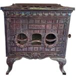 Poêle à bois ancien en fonte émaillée art deco marque phebus coloris aubergine