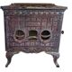Poêle à bois ancien en fonte émaillée art deco marque phebus coloris aubergine
