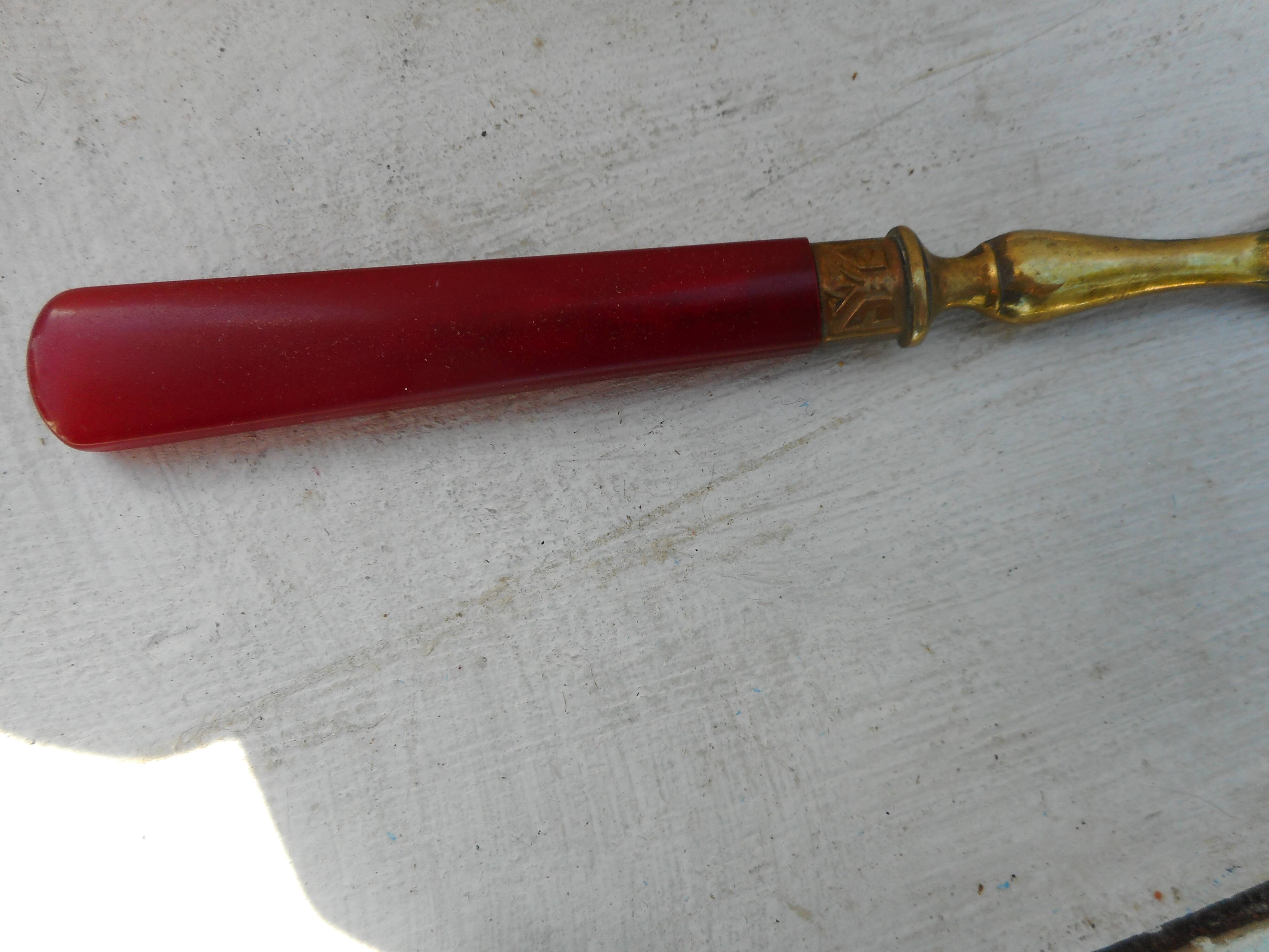 Twelve bakelite handle cake forks