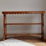 Vintage pine wall shelf with a scalloped front.