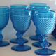 Old table set in blue pressed moulded glass