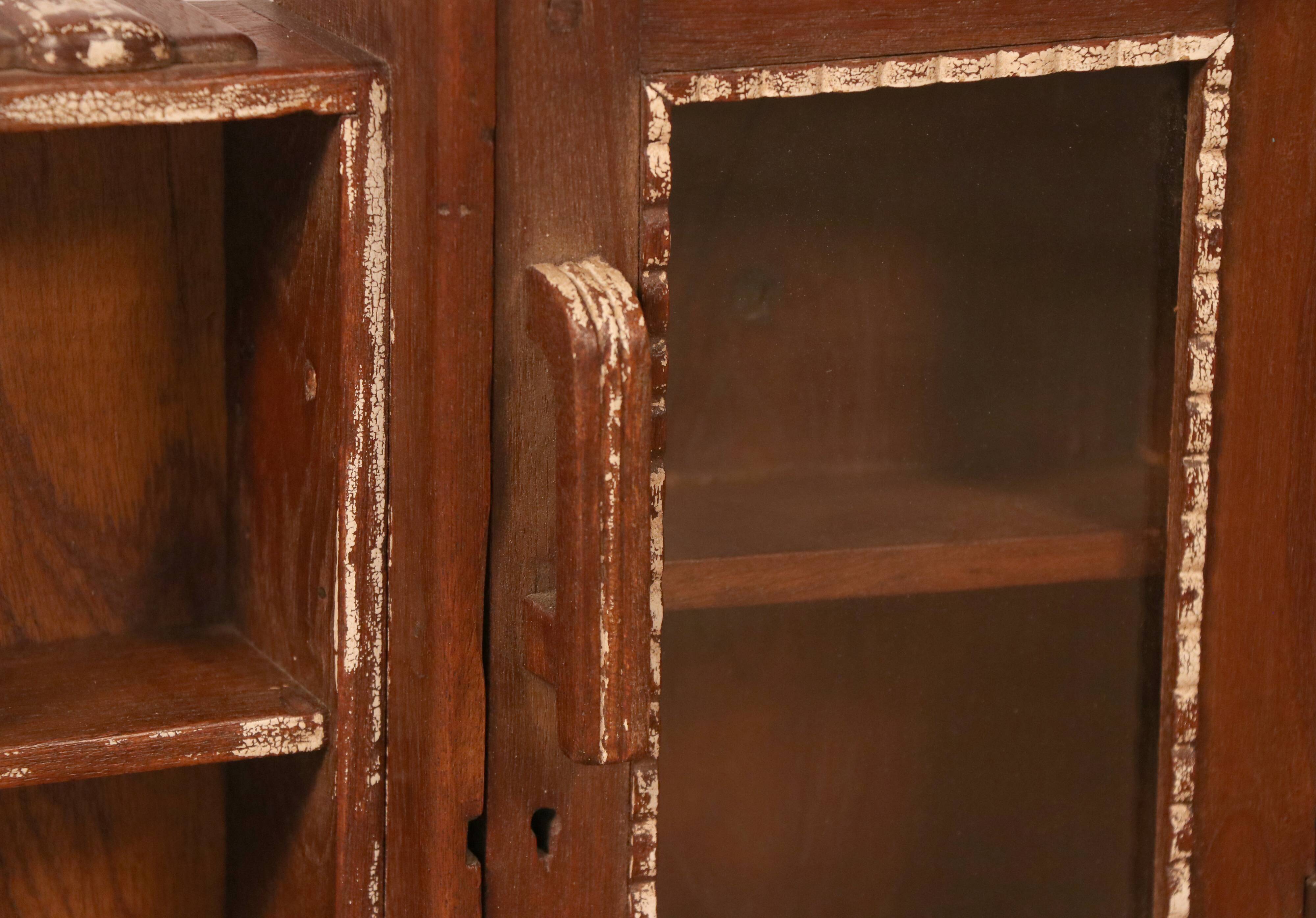 Old art deco showcase in burmese teak with original white edging