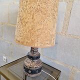 Ceramic lamp with openwork design and double lighting