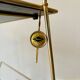 End table, Erdecor magazine holder in gold metal and black glass