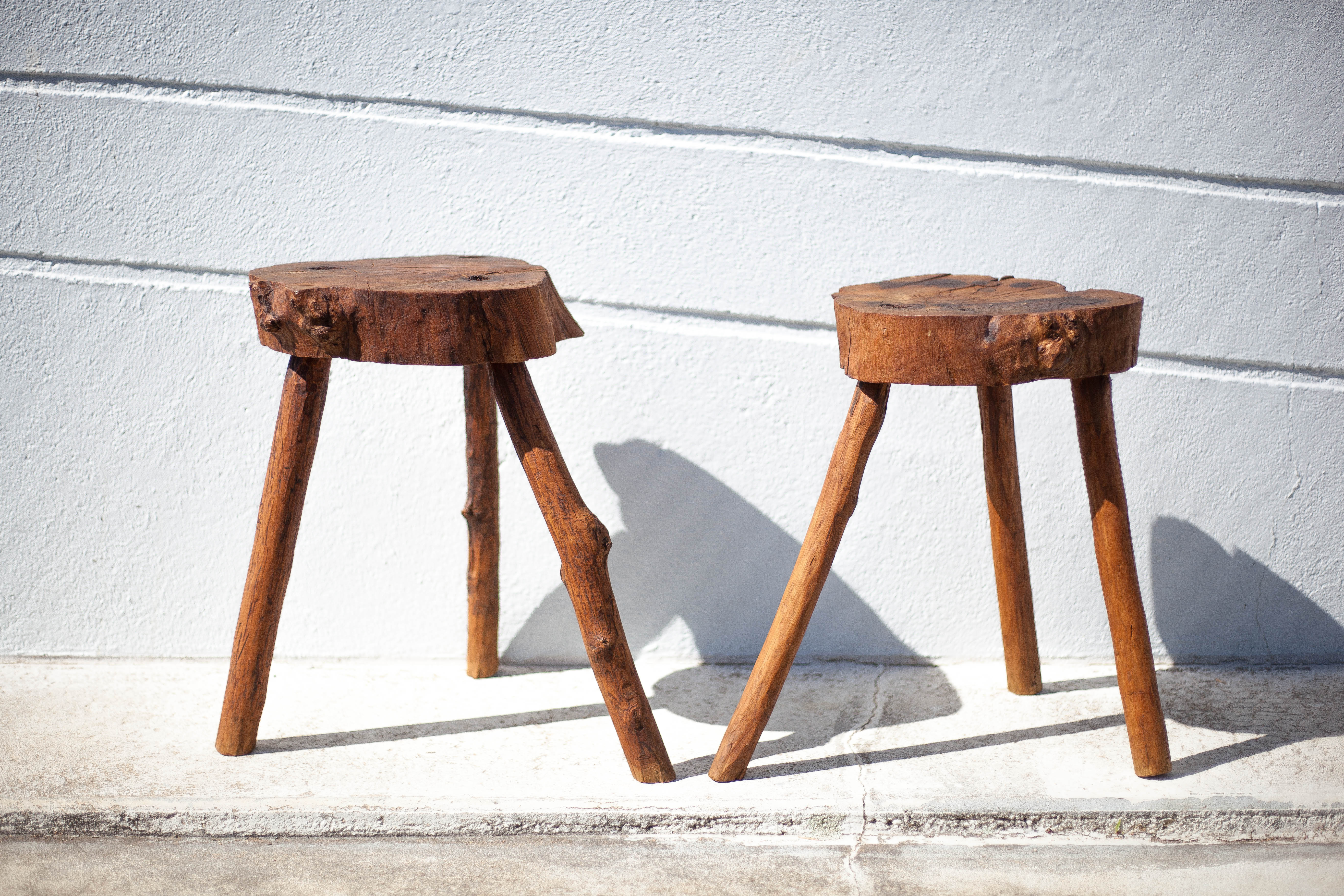 Pair of brutalist tripod wood stools