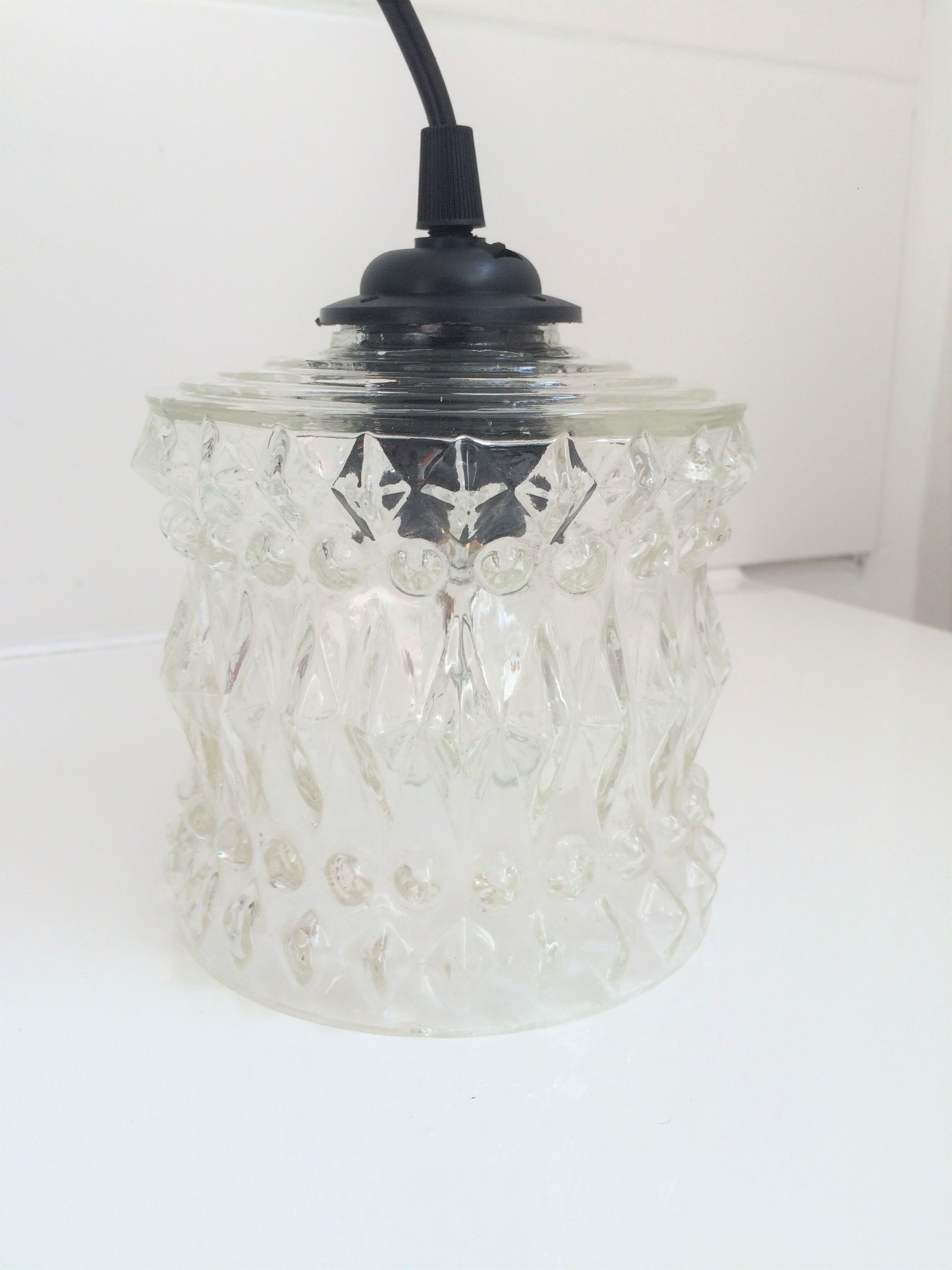 Chiseled glass suspension