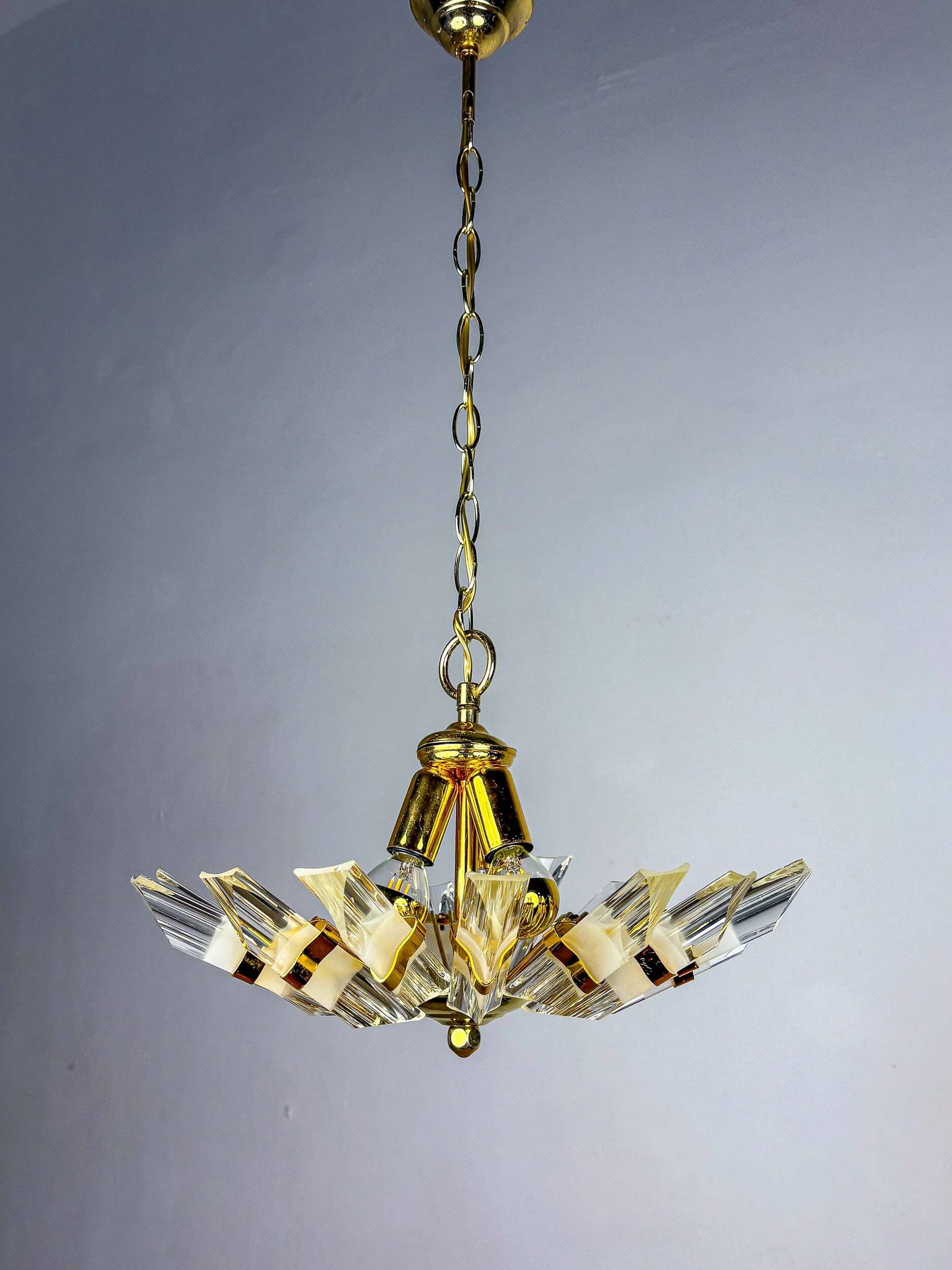 Sun-shaped chandelier by Oscar Torlasco for StilKronen, cut Murano glass, Italy 1970s