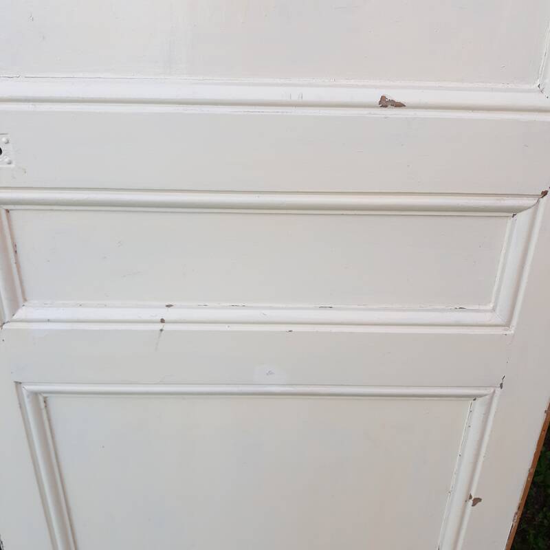 Communication door H220xW80.5cm, old panelled with moulding.