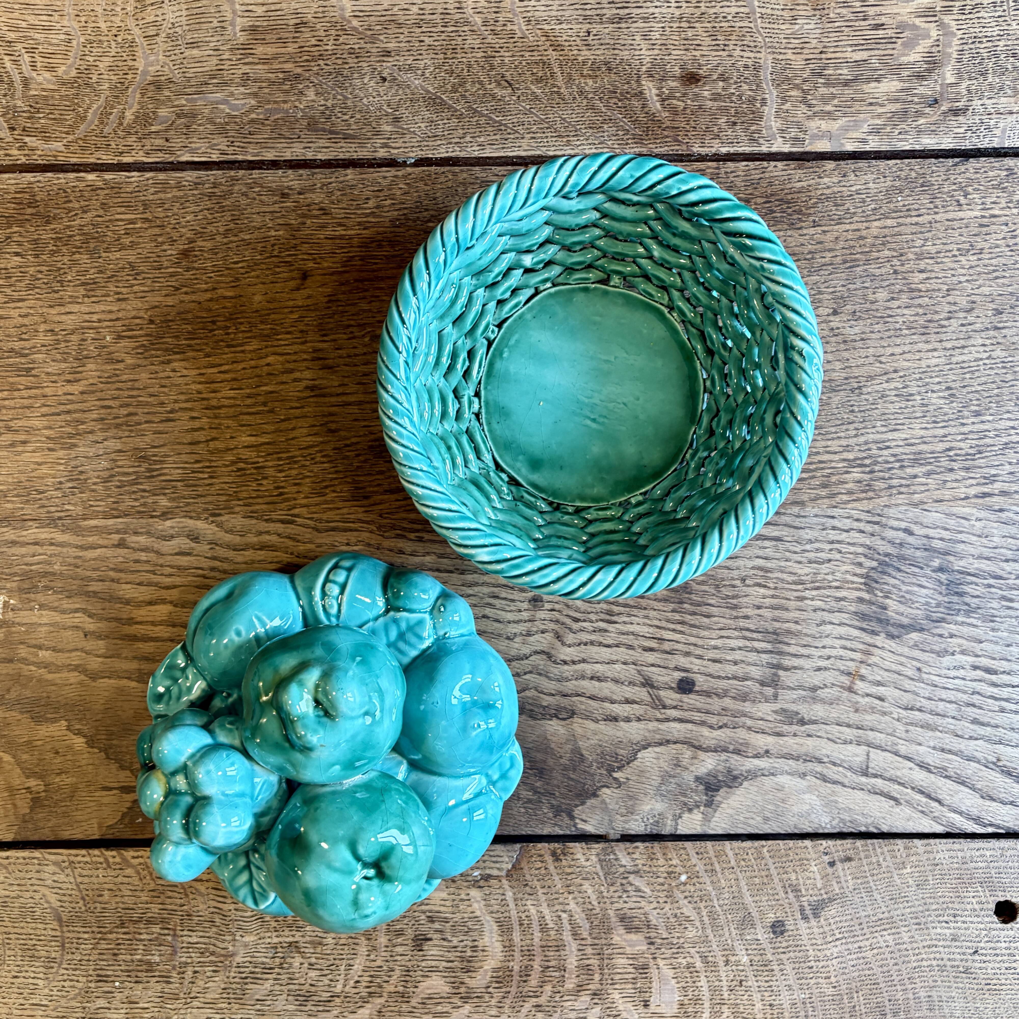 Vintage green earthenware plate/basket with fruit decorations.