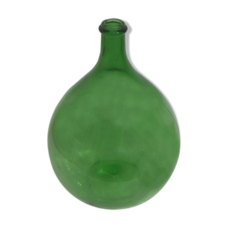 Demijohn in green glass