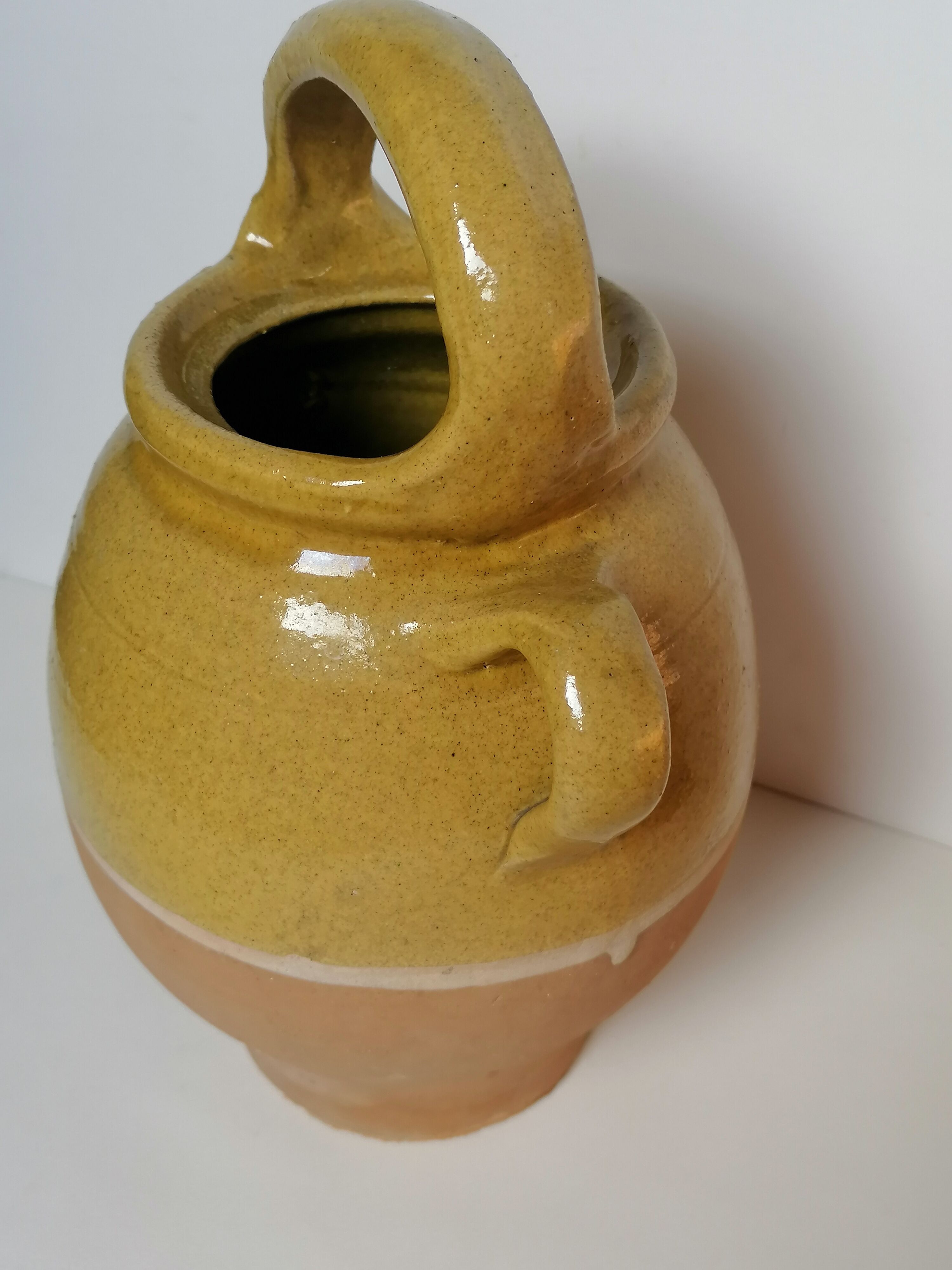 Yellow enamelled gargulette jug